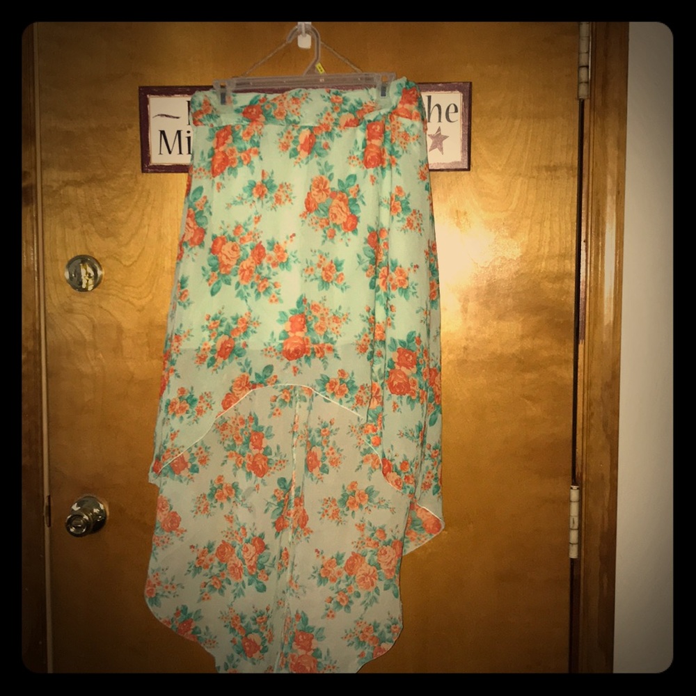 Floral orange and turquoise skirt.